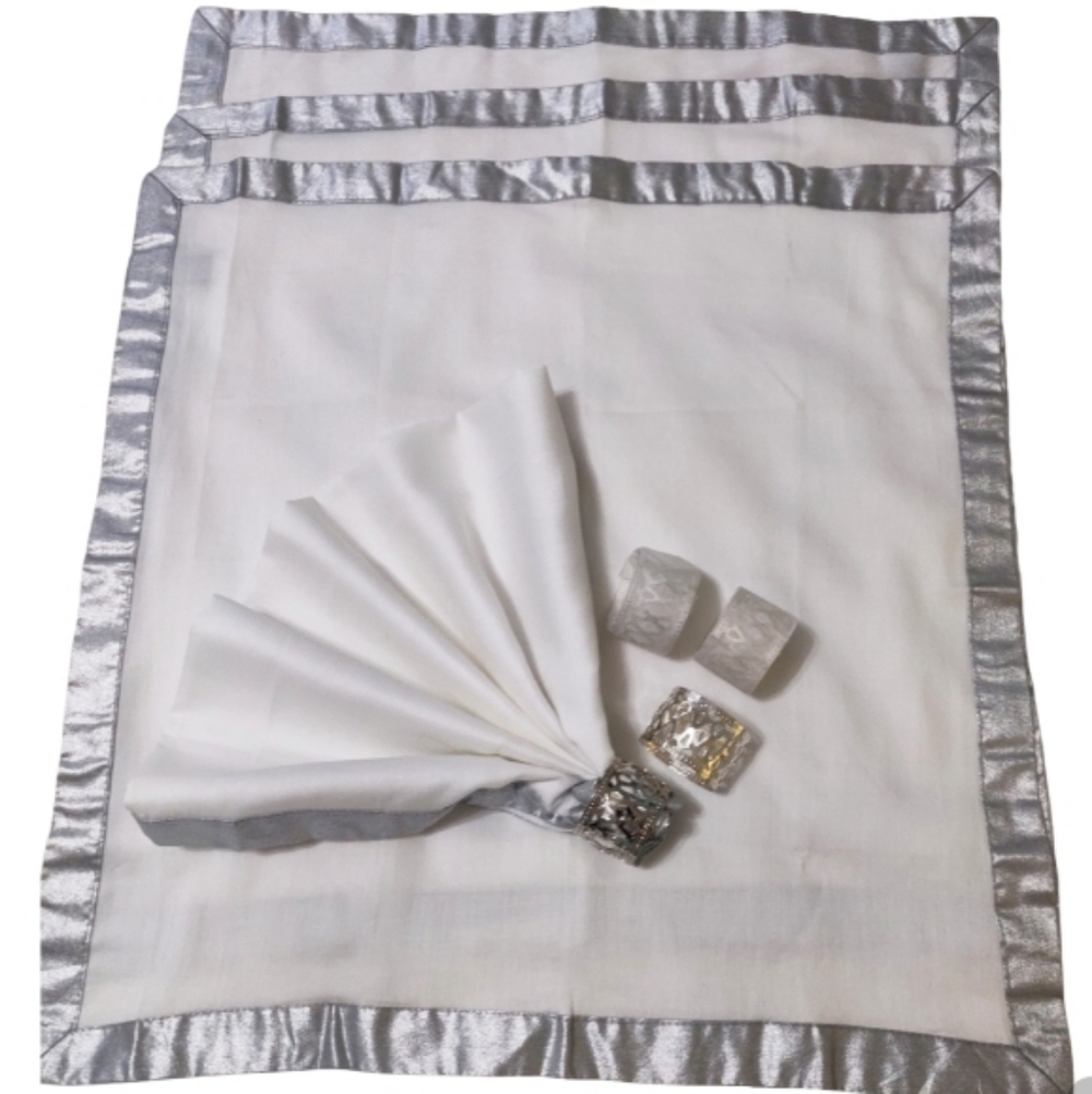 New Vintage Silver Plated Napkin Rings And Silver Bordered Napkins.